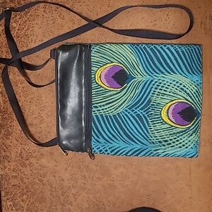 NWOT. Handmade cross body zippered bag. Peacock fabric